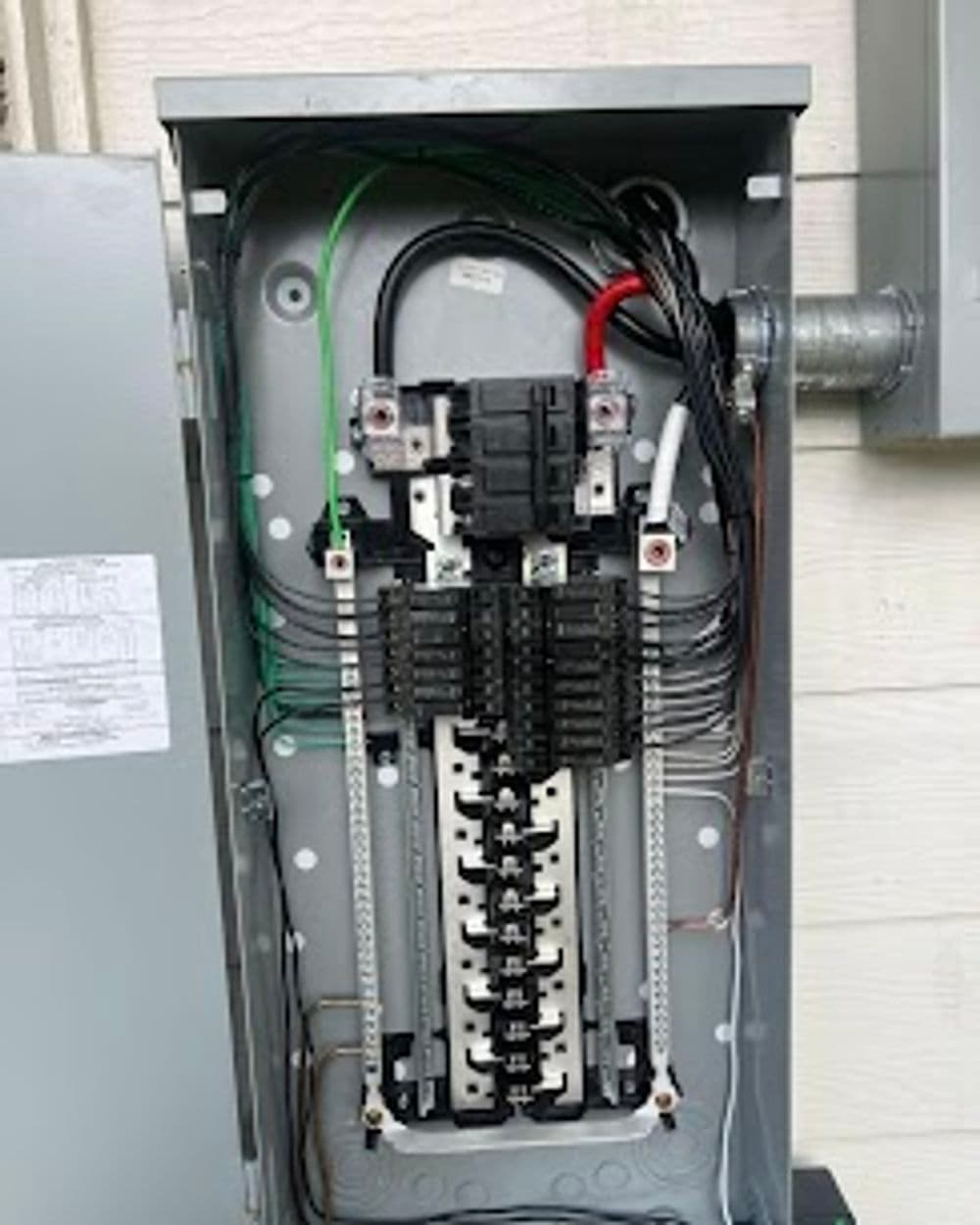 Electrical Panel Relocated to Exterior for Safety and Code Compliance