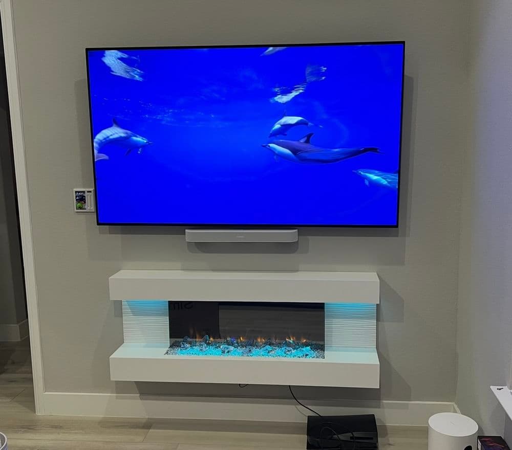 Electric Fireplace and TV Install in a Frisco Master Bedroom image